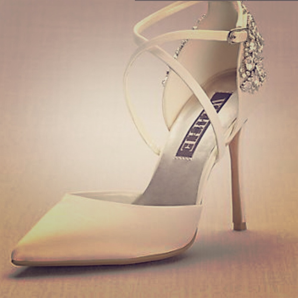 Pointed-toe Cross-strap heels by Vera Wang.